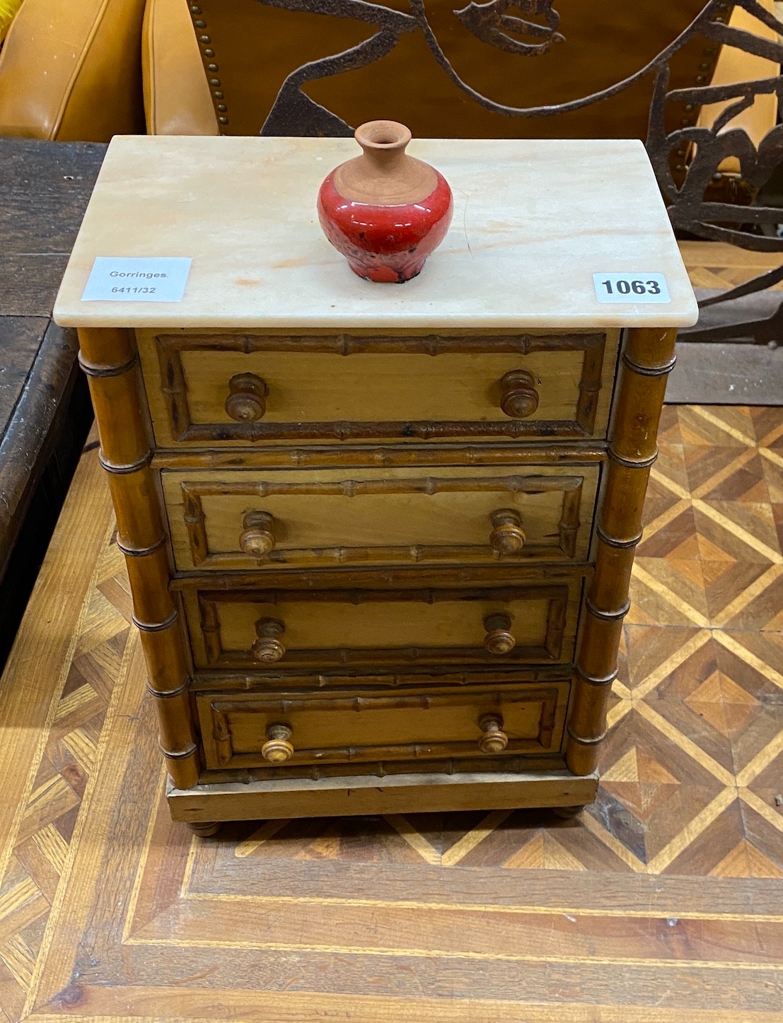 A Victorian style faux bamboo miniature chest, width 26cm, height 41cm